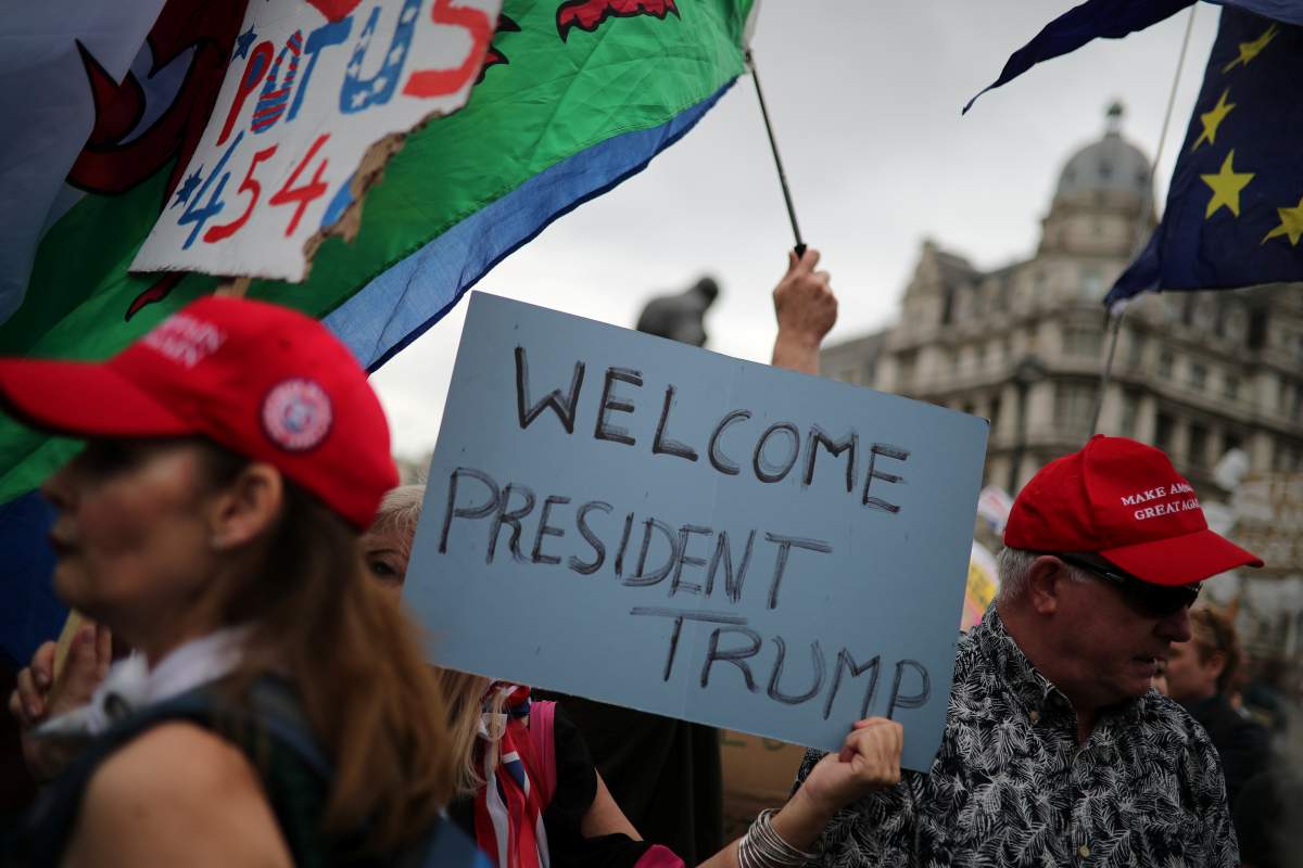 Supporters of U.S. President Donald Trump gather opposite the Houses of Parliament, during his state visit in London, Britain, June 4, 2019.