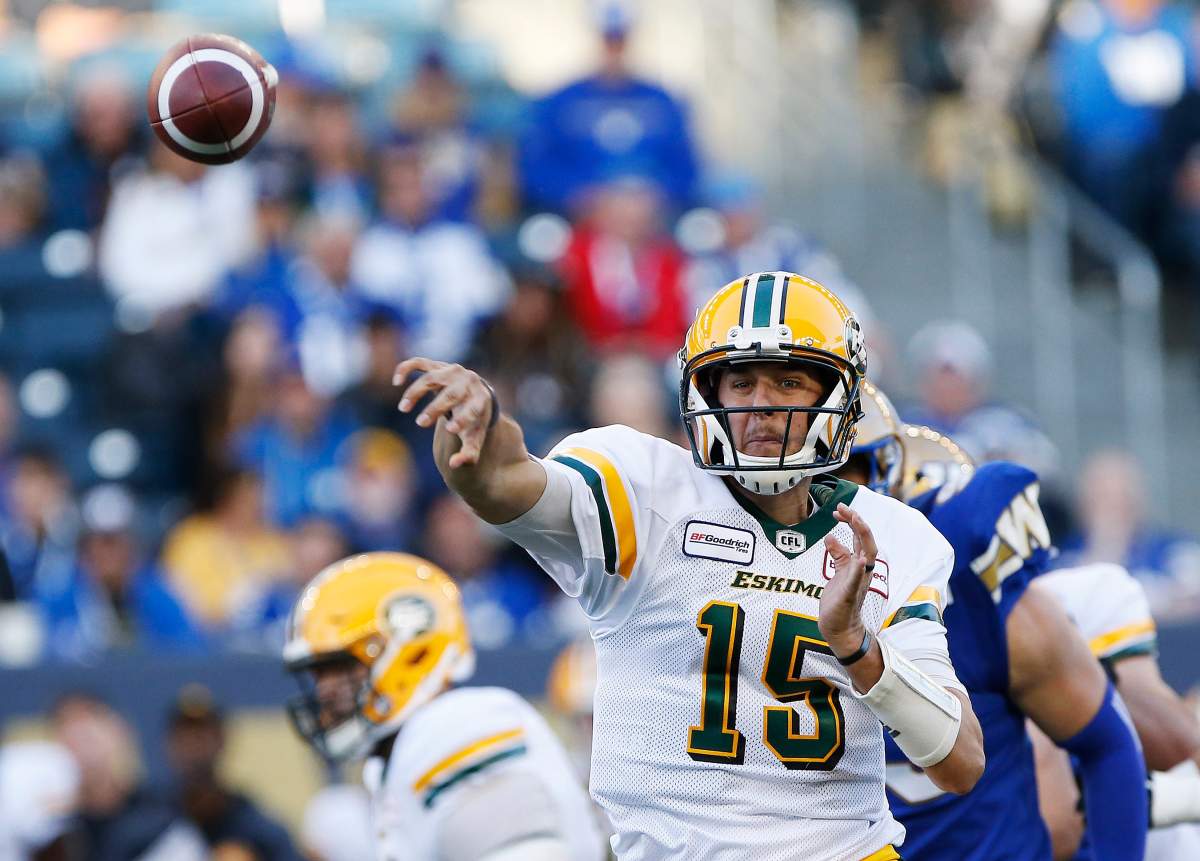 Edmonton Eskimos quarterback Matt Nichols (15) throws against the Winnipeg Blue Bombers during the first half of CFL action in Winnipeg Friday, May 31, 2019. THE CANADIAN PRESS/John Woods.