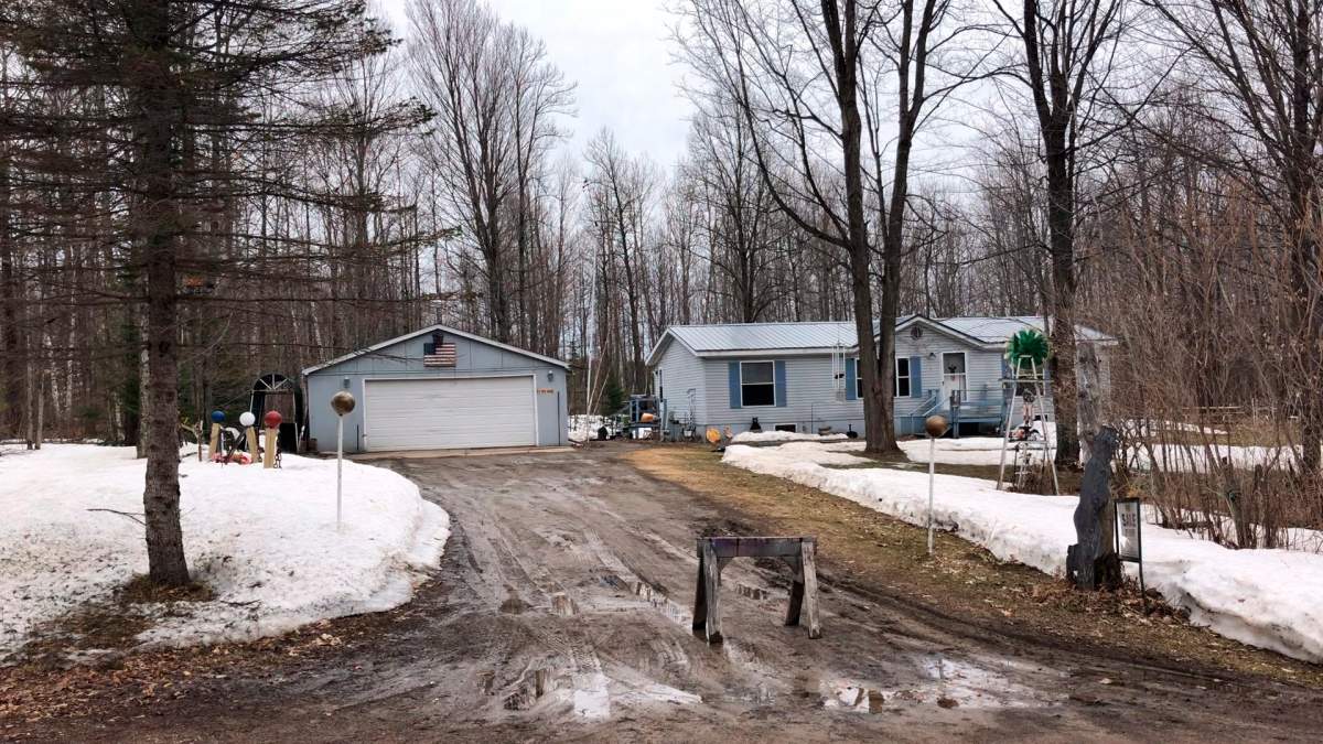 In this April 10, 2019 screenshot taken from a video is the house where Raymand Vannieuwenhoven lived in Lakewood, Wis. Prosecutors said they used DNA and genetic genealogy to connect Vannieuwenhoven to the killings 43 years ago of a young couple David Schuldes and Ellen Matheys.
