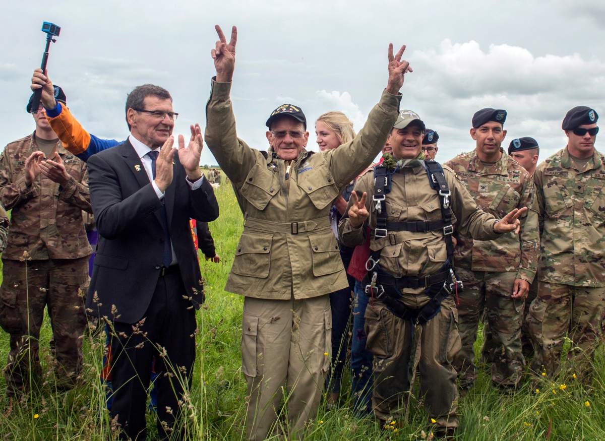U.S. World War II D-Day veteran Tom Rice after parachuting in a tandem jump into a field in Carentan, Normandy, France, Wednesday, June 5, 2019.