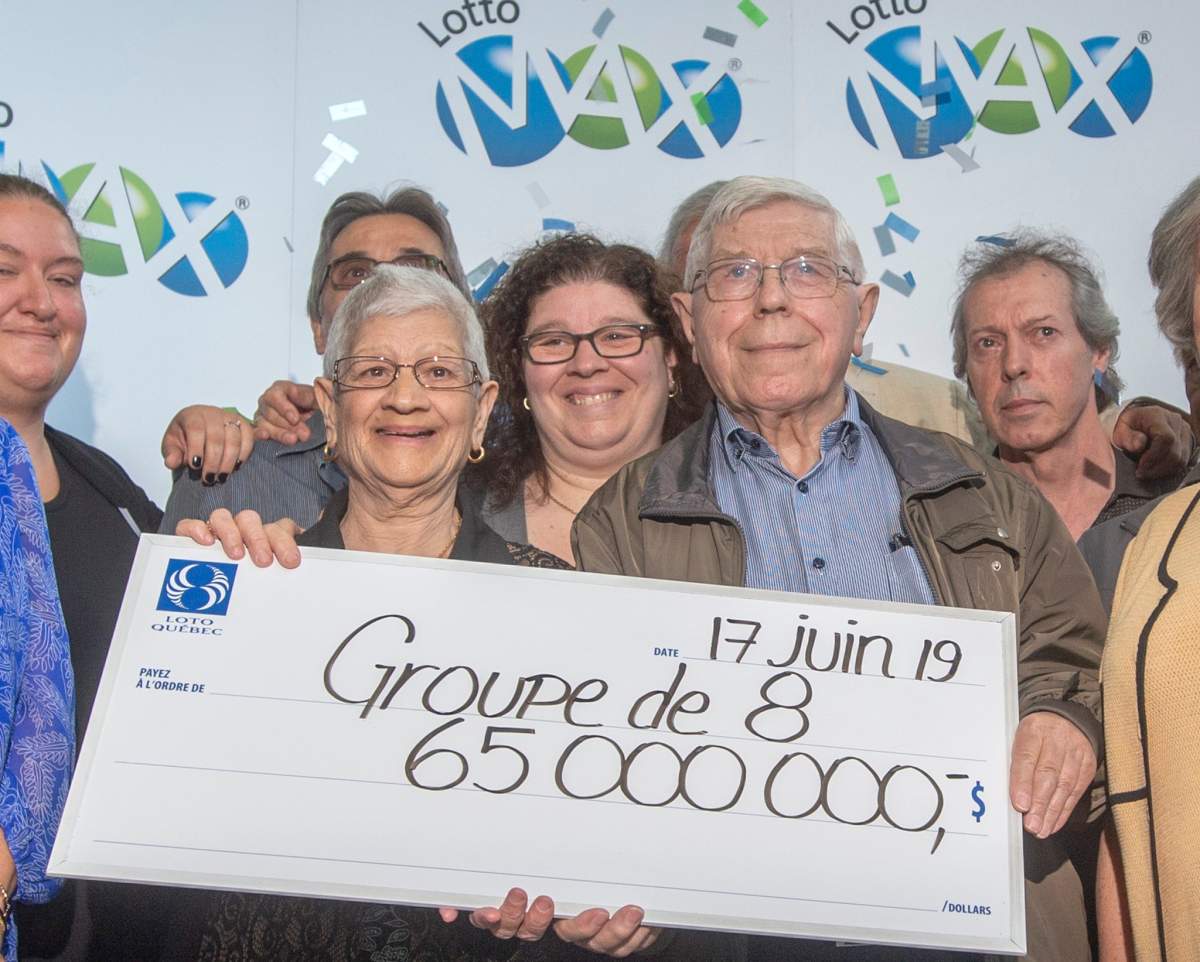 Giuseppa Lanteri and her husband, Nunzio, receive their Canadian record $65 Million Lotto Max cheque.