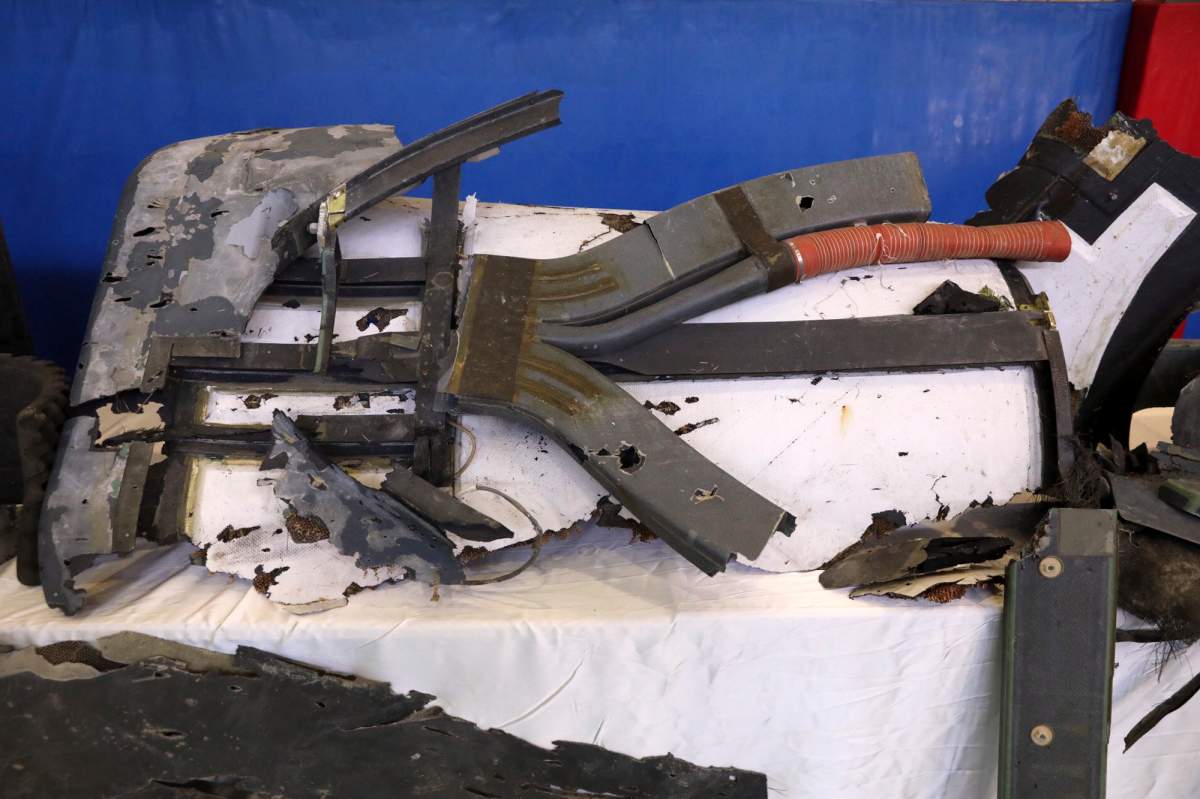 Debris from what Iran’s Revolutionary Guard aerospace division describes as the U.S. drone which was shot down on Thursday is displayed in Tehran, Iran, Friday, June 21, 2019.