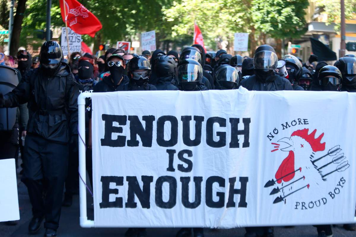 In a statement on Twitter, the Portland Police Bureau says injuries had occurred in the crowd as a result of the fights, but it did not specify how many, or whether arrests had been made. The bureau did not respond to phone calls or emails seeking clarification.