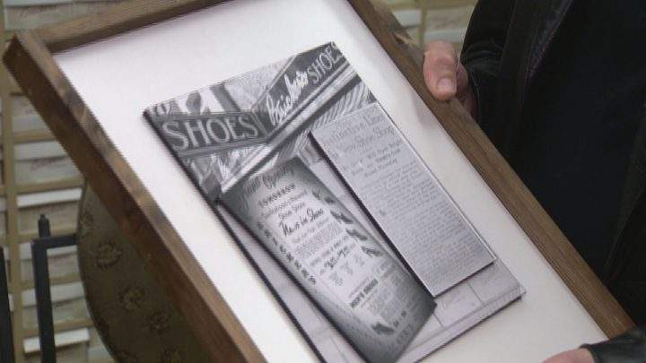 Owner Dan Cote holds a framed, old Bricker’s ad.