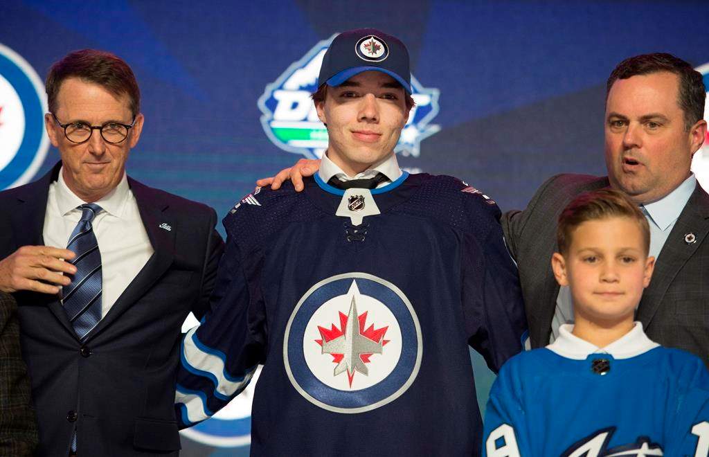 Winnipeg Jets select Ville Heinola during the first-round NHL draft at Rogers Arena in Vancouver, Friday, June 21, 2019. THE CANADIAN PRESS/Jonathan Hayward