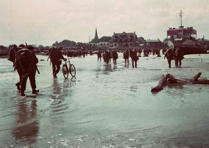 Canadian soldiers land on a Normandy, France beach during the D-Day invasion on June 6, 1944.