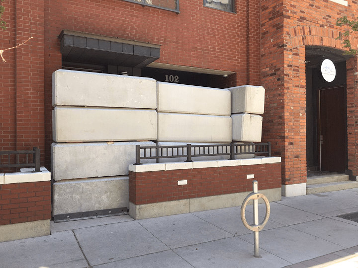 Concrete blocks could be seen blocking the entrance of an alleged illegal marijuana dispensary on St. Nicholas Street in Toronto.