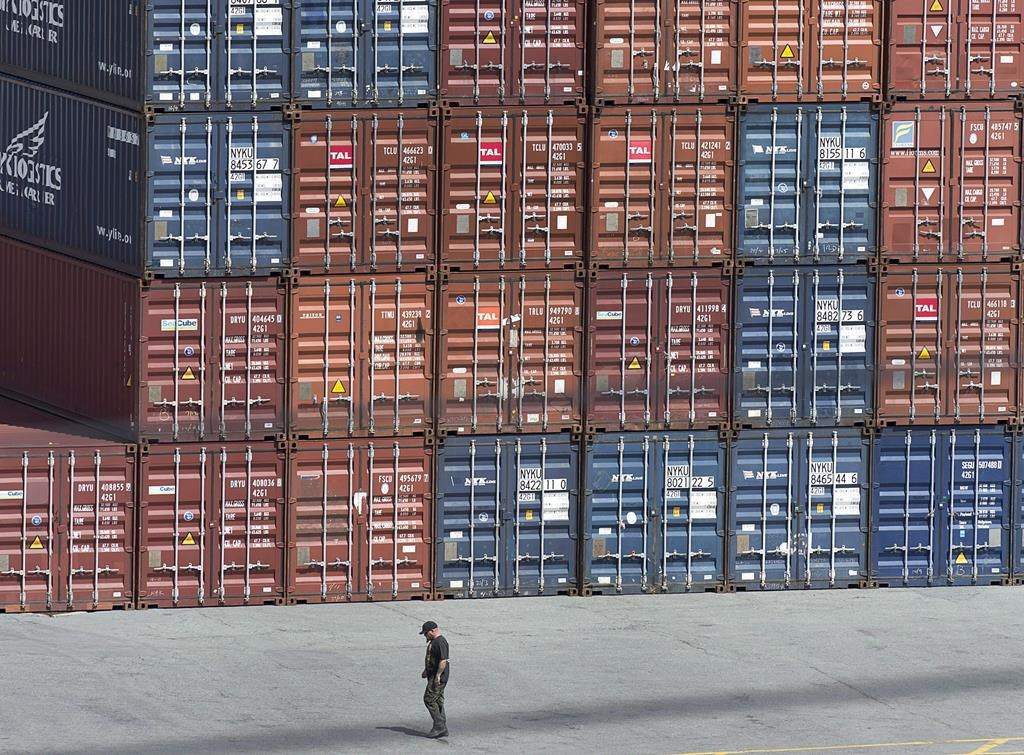 Shipping containers are seen at the Fairview Cove Container Terminal in in Halifax in August, 2017. Statistics Canada says the country's merchandise trade deficit shrank to $966 million in April, the smallest deficit since October last year.