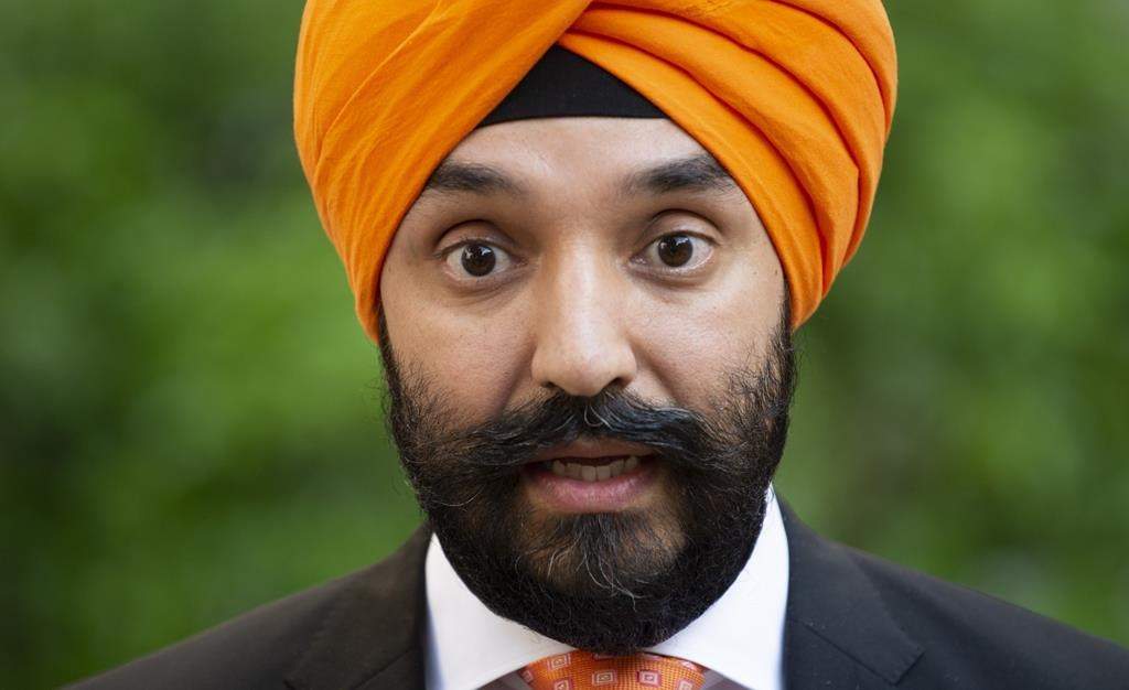 Innovation, Science and Economic Development Minister Navdeep Bains speaks with the media in Paris on May 15, 2019.