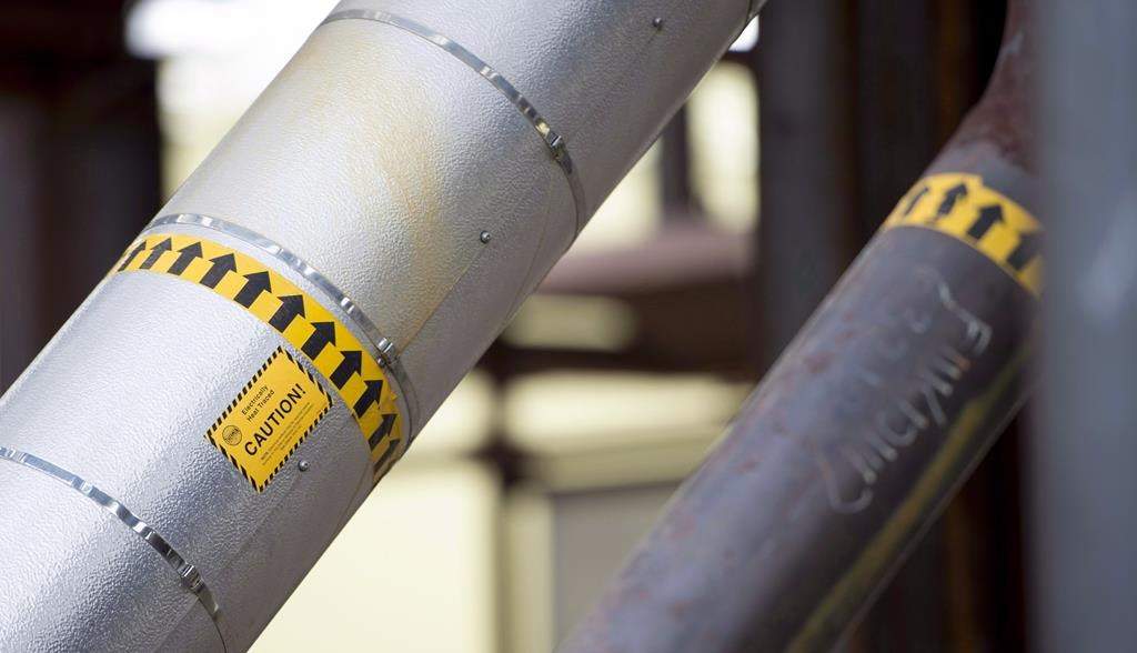 Pipes at the Shell Groundbirch Saturn natural gas plant are seen near Fort St. John, B.C., Thursday, Oct. 11, 2018.