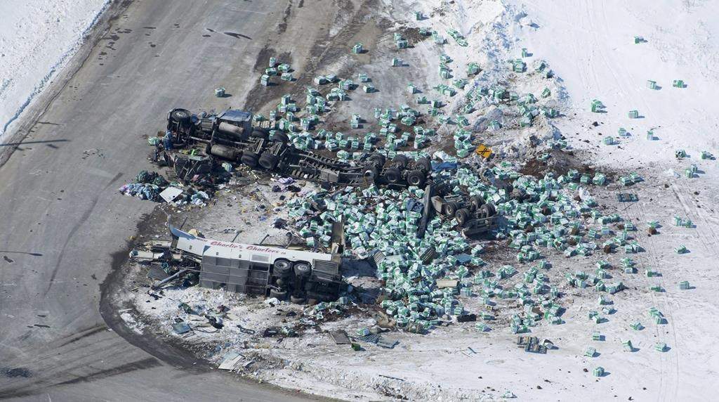 The wreckage of a fatal crash involving the team bus for the the Humboldt Broncos hockey team outside of Tisdale, Sask., is seen Saturday, April, 7, 2018.