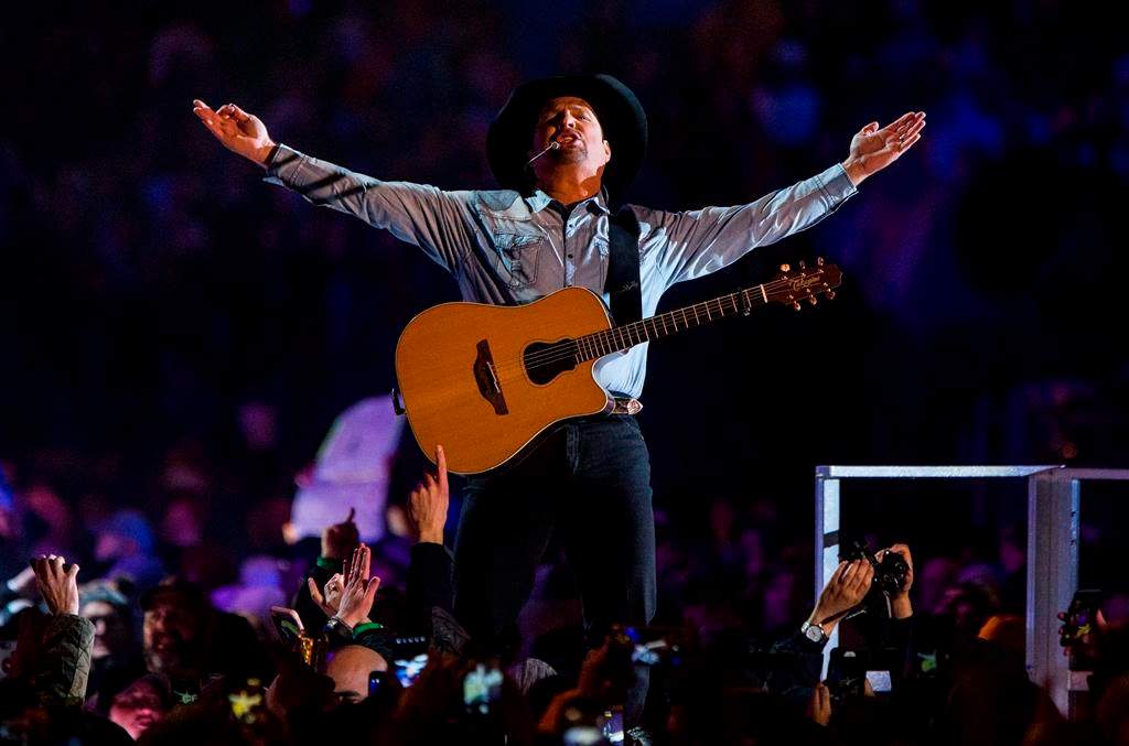 Garth Brooks performs before a sold-out crowd at Notre Dame Stadium Saturday, Oct. 20, 2018, in South Bend, Ind.