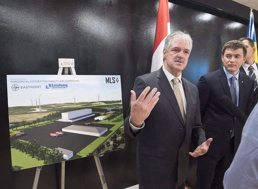 Stephen Matier, left, president of Maritime Launch Services talks with reporters at a meeting of the proposed Spaceport project team in Dartmouth, N.S. on Monday, Dec. 11, 2017.