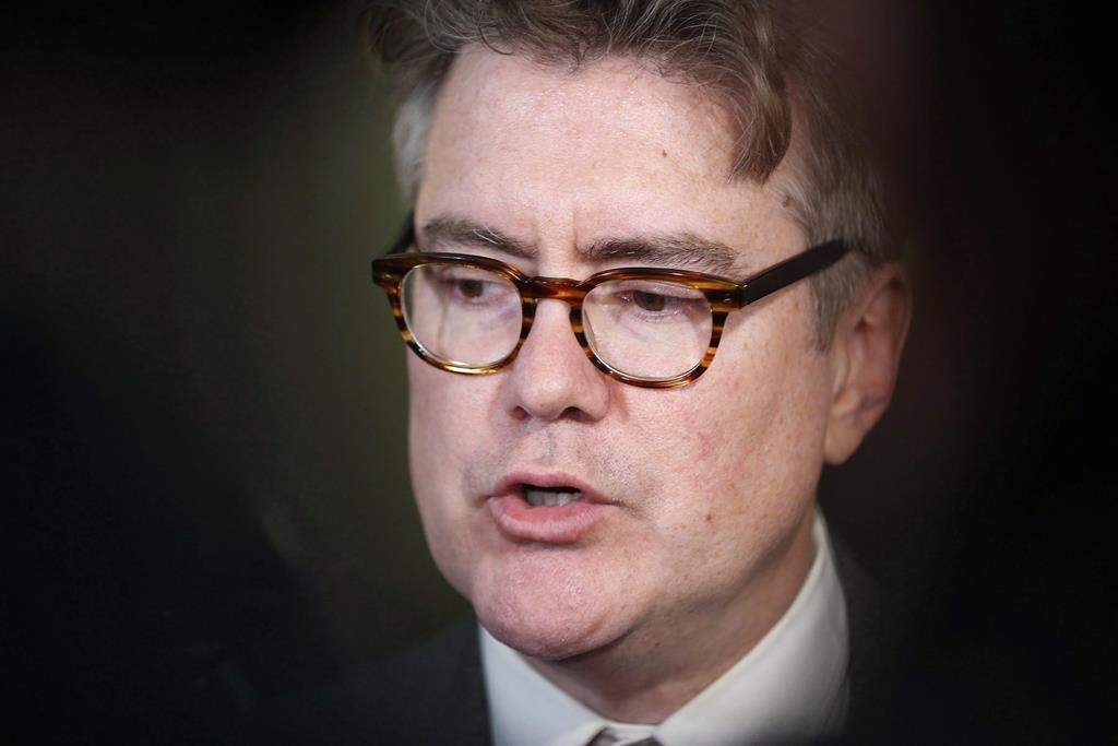 Manitoba Liberal Leader Dougald Lamont speaks to media outside the legislature after the provincial throne speech was read at the Manitoba Legislature in Winnipeg, Tuesday, November 21, 2017. Manitoba Liberal Leader Dougald Lamont says he will not commit to releasing a fully costed election platform that would spell out how he would pay for his promises. THE CANADIAN PRESS/John Woods.