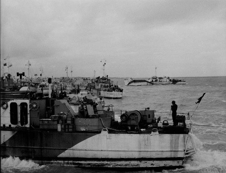 Allied warships are shown at Bernieres-sur-Mer, France on June 6, 1944.