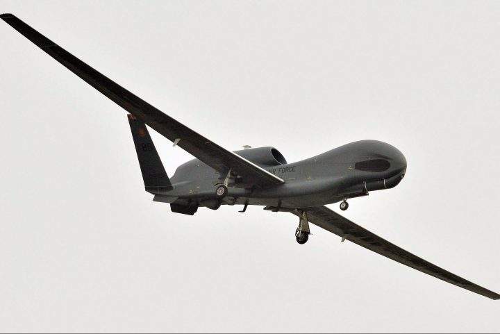 A U.S. Global Hawk surveillance drone prepares to land at the Misawa Air Base in Misawa, northern Japan, Saturday, May 24, 2014.