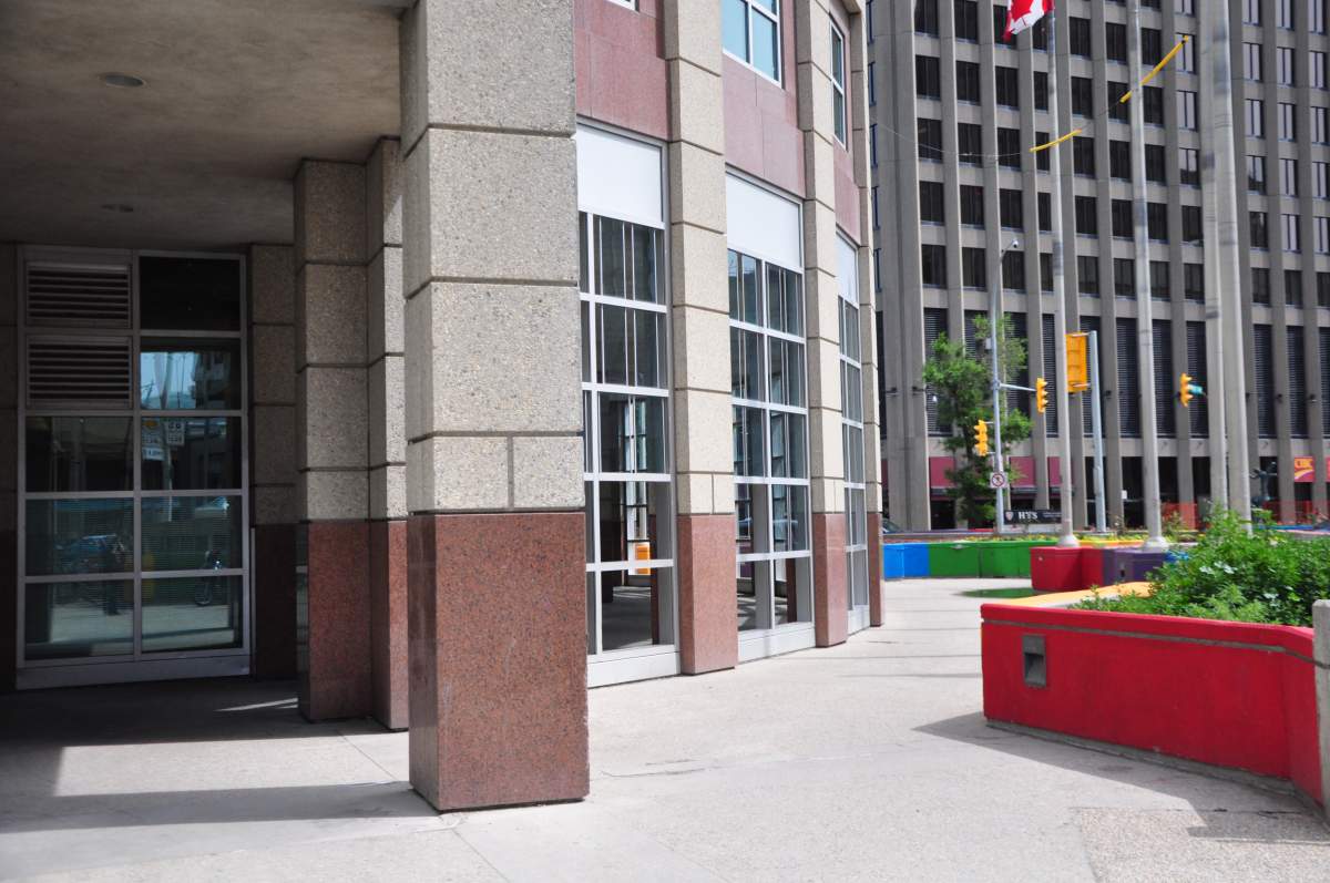 The glassed-in walkway, also called an arcade, could be incorporated into the building for retail space.