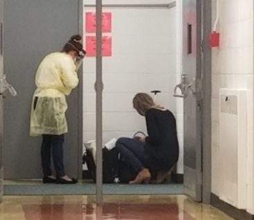 Alberta Health Services staff at Evansdale School in Edmonton on Friday, June 7, 2019.