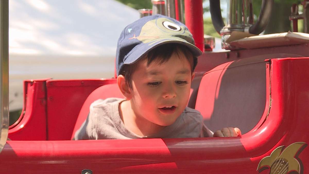 Children got to get behind the wheel of some of the historic vehicles.