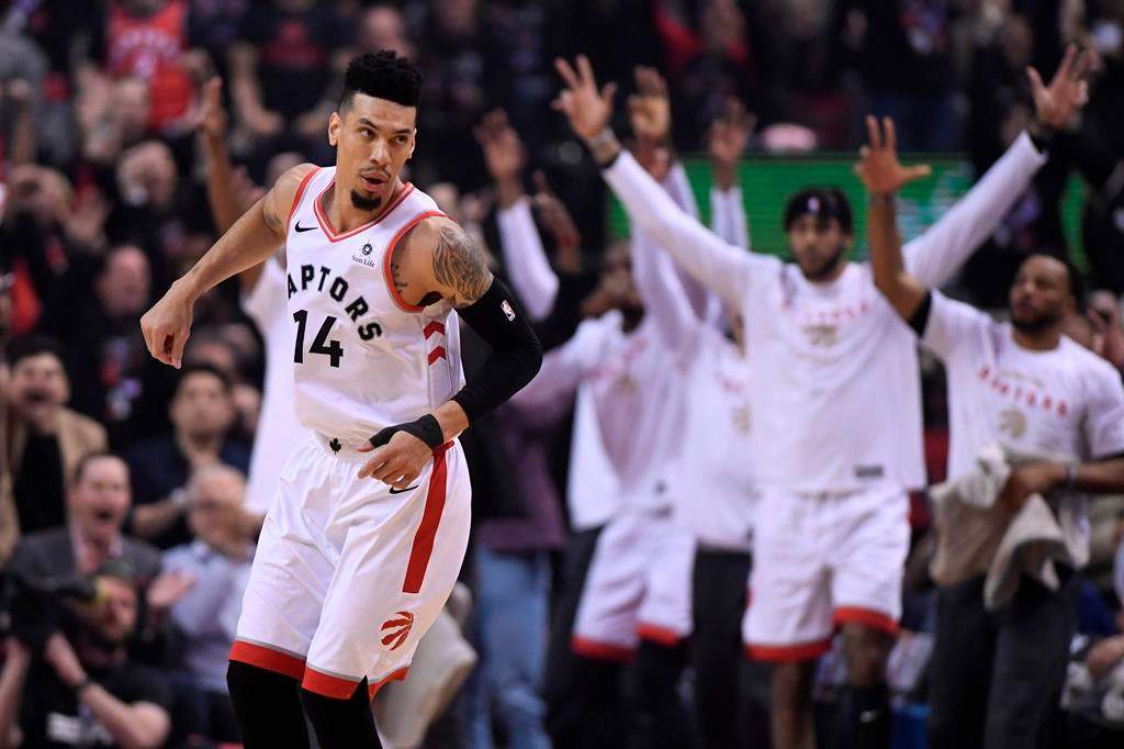 Toronto Raptors guard Danny Green (14) reacts after making a three-pointer against the Golden State Warriors during first half basketball action in Game 1 of the NBA Finals in Toronto on Thursday, May 30, 2019.