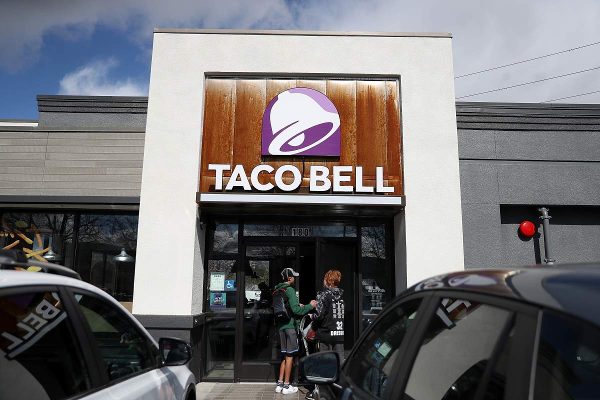 NOVATO, CA - FEBRUARY 22:  Customers enter a Taco Bell restaurant on February 22, 2018 in Novato, California. Taco Bell has become the fourth-largest domestic restaurant brand by edging out Burger King. Taco Bell sits behind the top three restaurant chains McDonald's, Starbucks and Subway.  (Photo by Justin Sullivan/Getty Images).