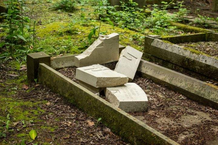 A damaged gravestone belonging to Arthur Sheard, who served in the First World War, is shown in West Yorkshire, U.K., in this image posted online June 6, 2019.
