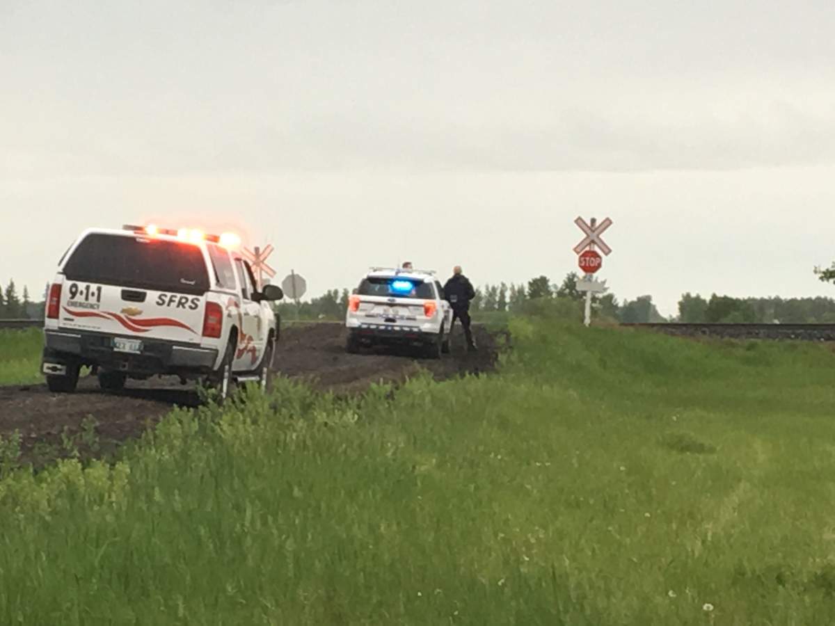 Emergency personnel on the scene in Oakbank, Man. Sunday, June 16, 2019.