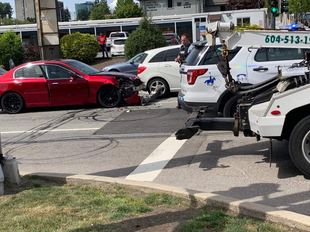 Two people were arrested Tuesday after a multi-vehicle crash involving a police cruiser and an allegedly stolen car. 