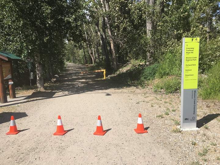 Part of Mission Creek Greenway was blocked off while fire crews contained the blaze.