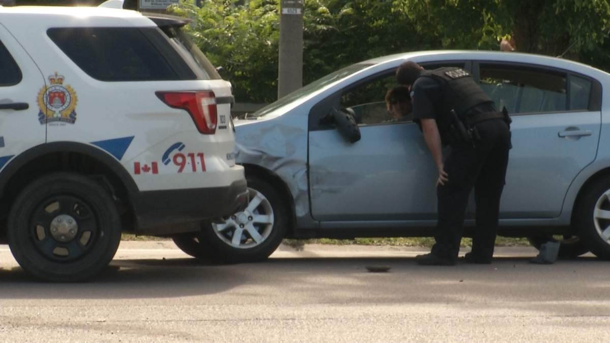 Kingston police say two suspects rammed a police cruiser in order to escape arrest.