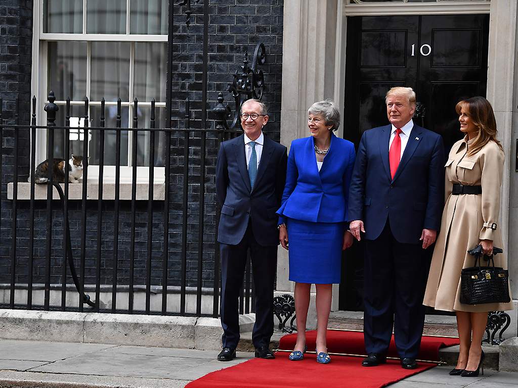 Prime Minister Theresa May and husband Philip May welcome US President Donald Trump and First Lady Melania Trump to 10 Downing Street as Larry the Cat sits on the window ledge, during the second day of his State Visit on June 4, 2019 in London, England.