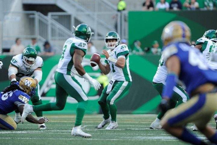 Saskatchewan Roughriders quarterback Zach Collaros looks for a receiver against the Winnipeg Blue Bombers during first half CFL pre-season action at Mosaic Stadium in Regina on Thursday, June 6, 2019.