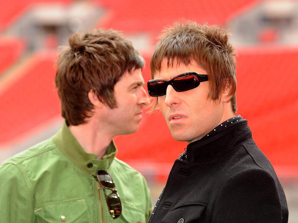 Noel Gallagher and Liam Gallagher, pictured during a photocall at Wembley Stadium in 2008.