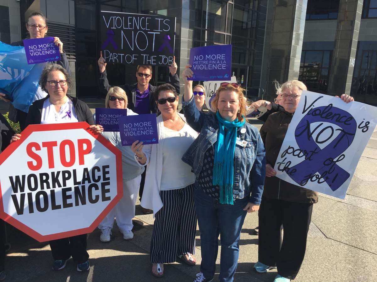 A group of nurses outside the Moncton Provincial Courthouse on June 4, 2019.