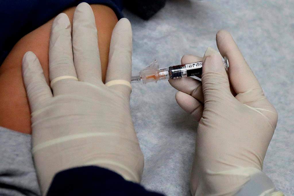 Vaccine task force defends Manitoba plan as data shows just over half of province’s doses administered - image