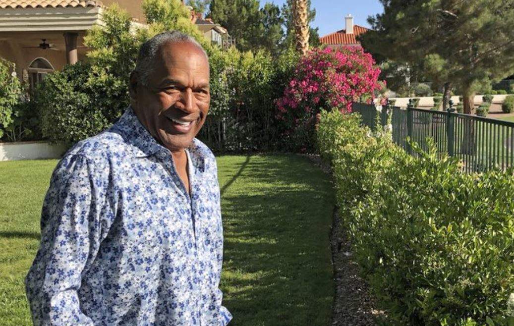 This photo provided by Didier J. Fabien shows O.J. Simpson in the garden of his Las Vegas area home on Monday, June 3, 2019. After 25 years living under the shadow of one of the nation’s most notorious murder cases, Simpson says his life now is fine. 