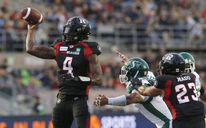 Ottawa Redblacks quarterback Dominique Davis (4) throws the ball during first quarter CFL action against the Saskatchewan Roughriders in Ottawa on Thursday, June 20, 2019. 
