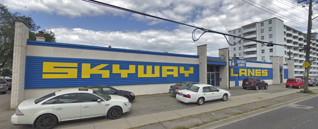The hate crime unit has been called in after Hamilton police say racist graffiti was spray-painted on the doors of a recently closed bowling alley in the city’s east end.