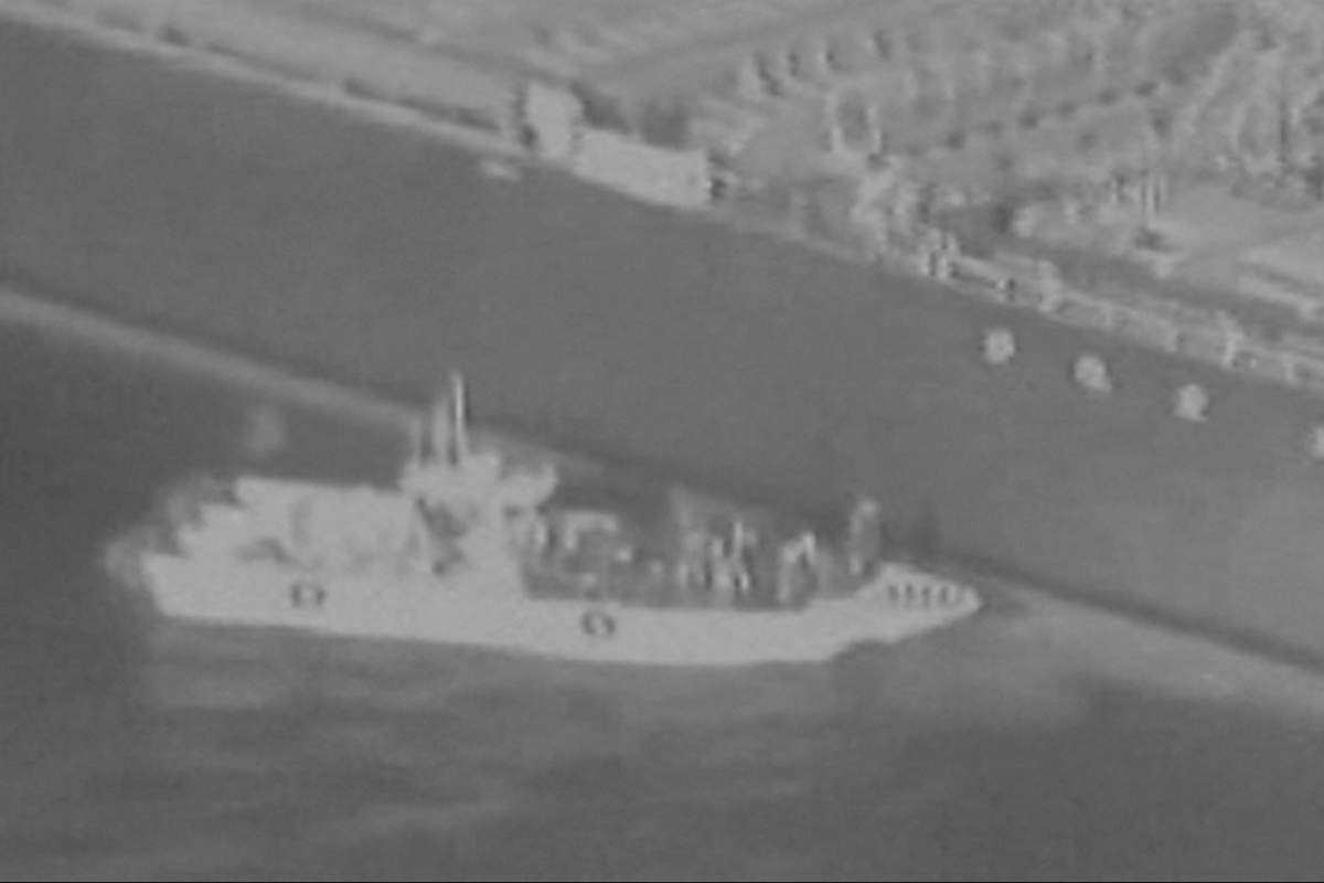 This still image taken from a U.S. military handout video purports to show Iran’s Revolutionary Guard removing an unexploded limpet mine from the side of the Kokuka Courageous Tanker, June 13, 2019.