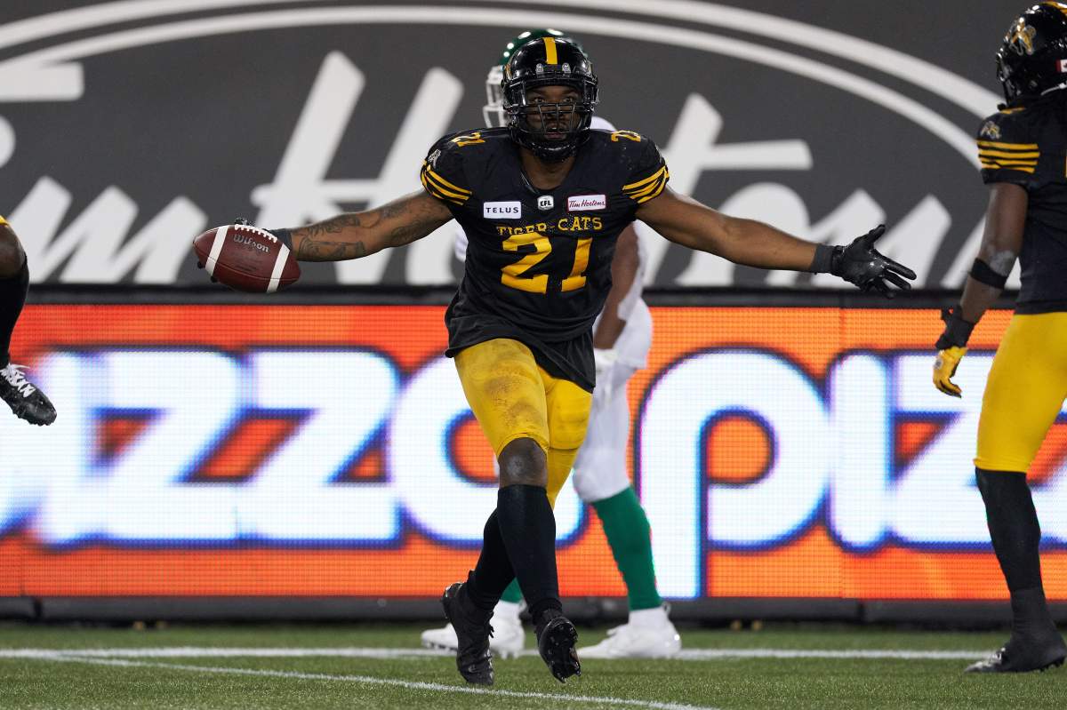 Hamilton's Simoni Lawrence celebrates during third quarter CFL action between the Saskatchewan Roughriders and the Ticats in Hamilton on Thursday June 13, 2019.