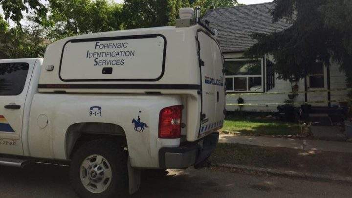 Members of the RCMP forensic unit search a home in North Battleford, Sask., on June 8, 2019, as part of the investigation into the disappearance of Tiki Brook-Lyn Laverdiere, which is now being called a homicide by police.