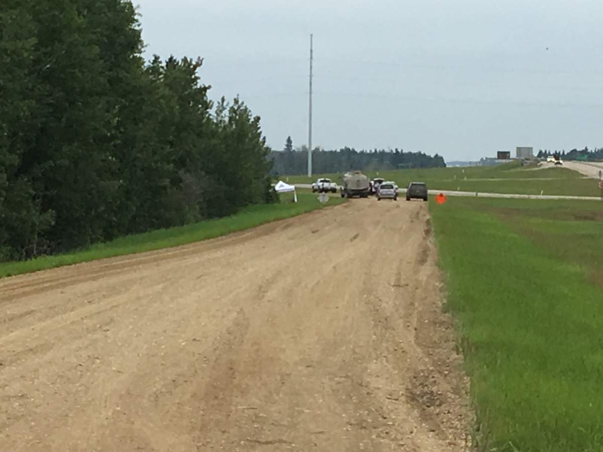 Strathcona County RCMP investigate body found in field near Highway 14 and Highway 21, July 10, 2019.