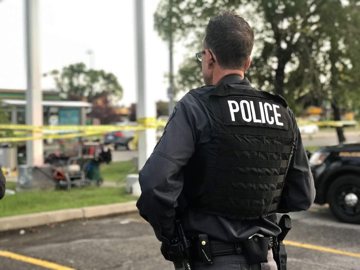 Calgary police investigate an assault in a parking lot in Whitehorn on July 18, 2019.