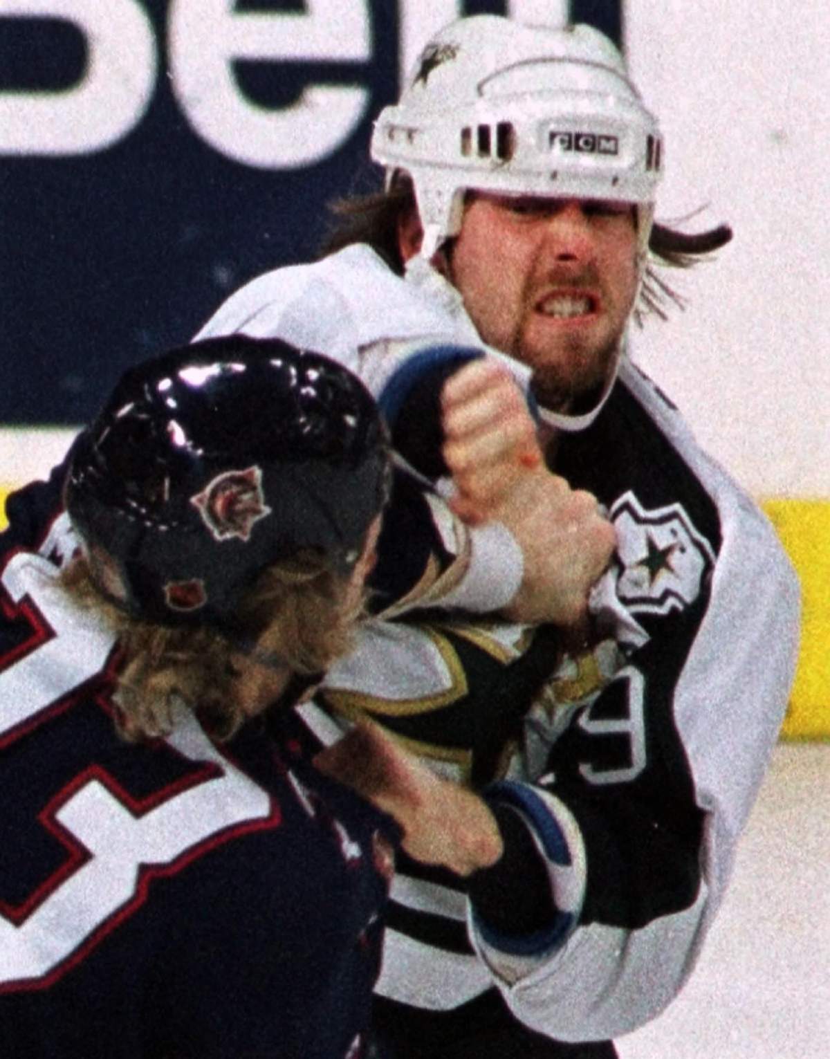 Dallas Stars right wing Grant Marshall and Edmonton Oilers defender Marty McSorley (33) fight during the first period in Dallas, Monday, Feb. 15, 1999. There were 78 penalty minutes served in the first period by the two teams.