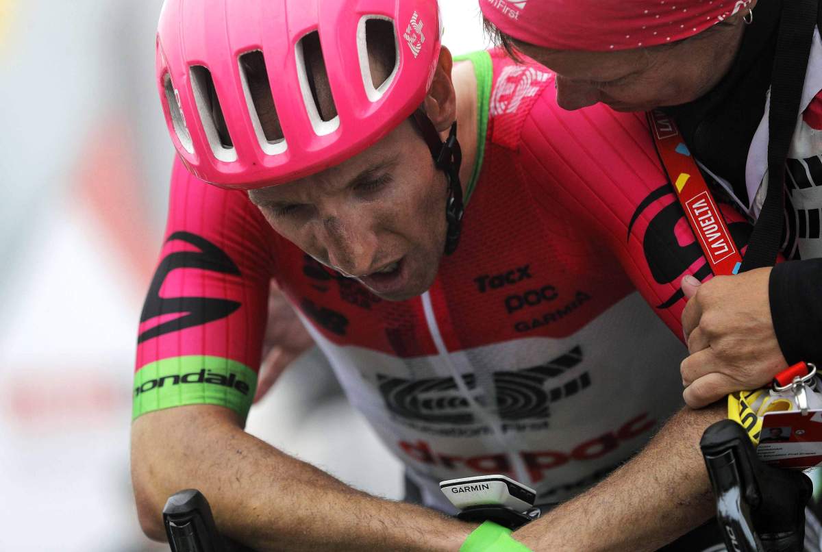 Canadian rider Michael Woods, of Education First team, reacts after winning the 17th stage of the 2018 La Vuelta cycling tour, 12 September 2018. Ignoring two broken ribs, Woods finished 88th in Thursday's 209.5-kilometre Stage 12 of the Tour de France.