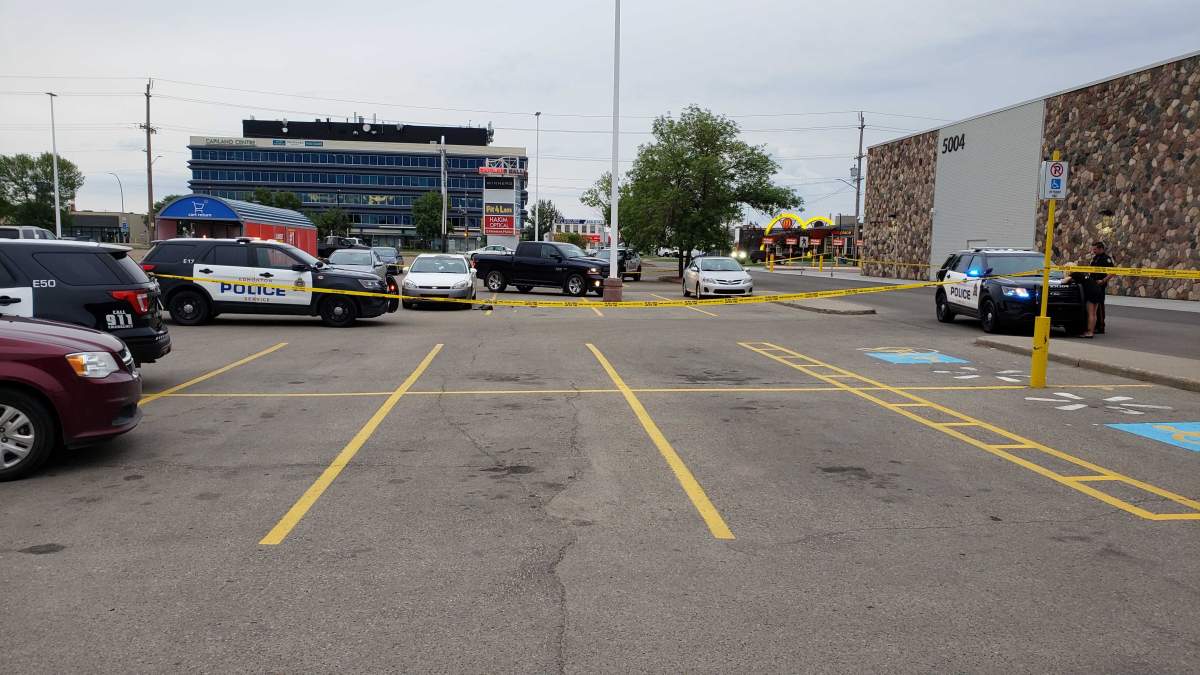 Edmonton police respond to an incident outside the Capilano Walmart Saturday night. 