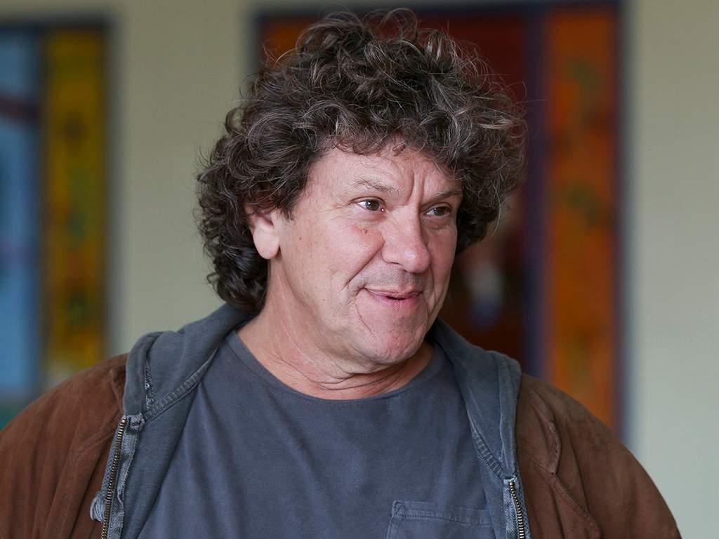 In this Wednesday, Oct. 14, 2015, file photo, Michael Lang speaks during a tour at the former Zena Elementary School in Woodstock, N.Y.