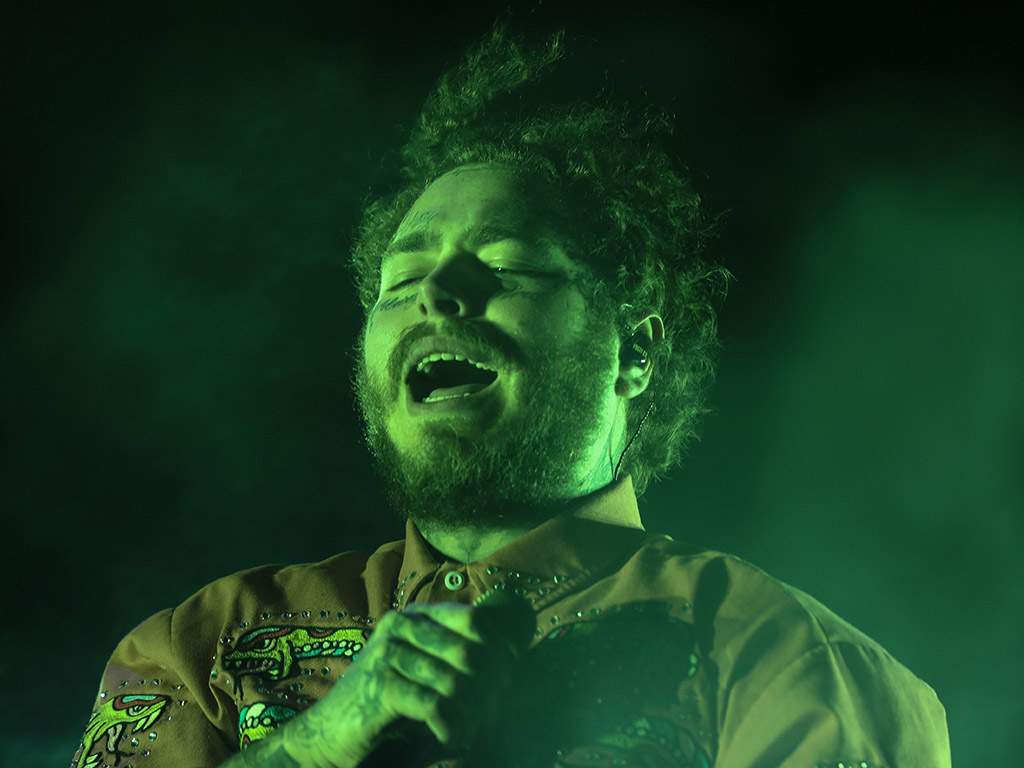 Post Malone performs on stage at the ninth version of the Lollapalooza music festival 2019 in Santiago, Chile, on March 30, 2019.