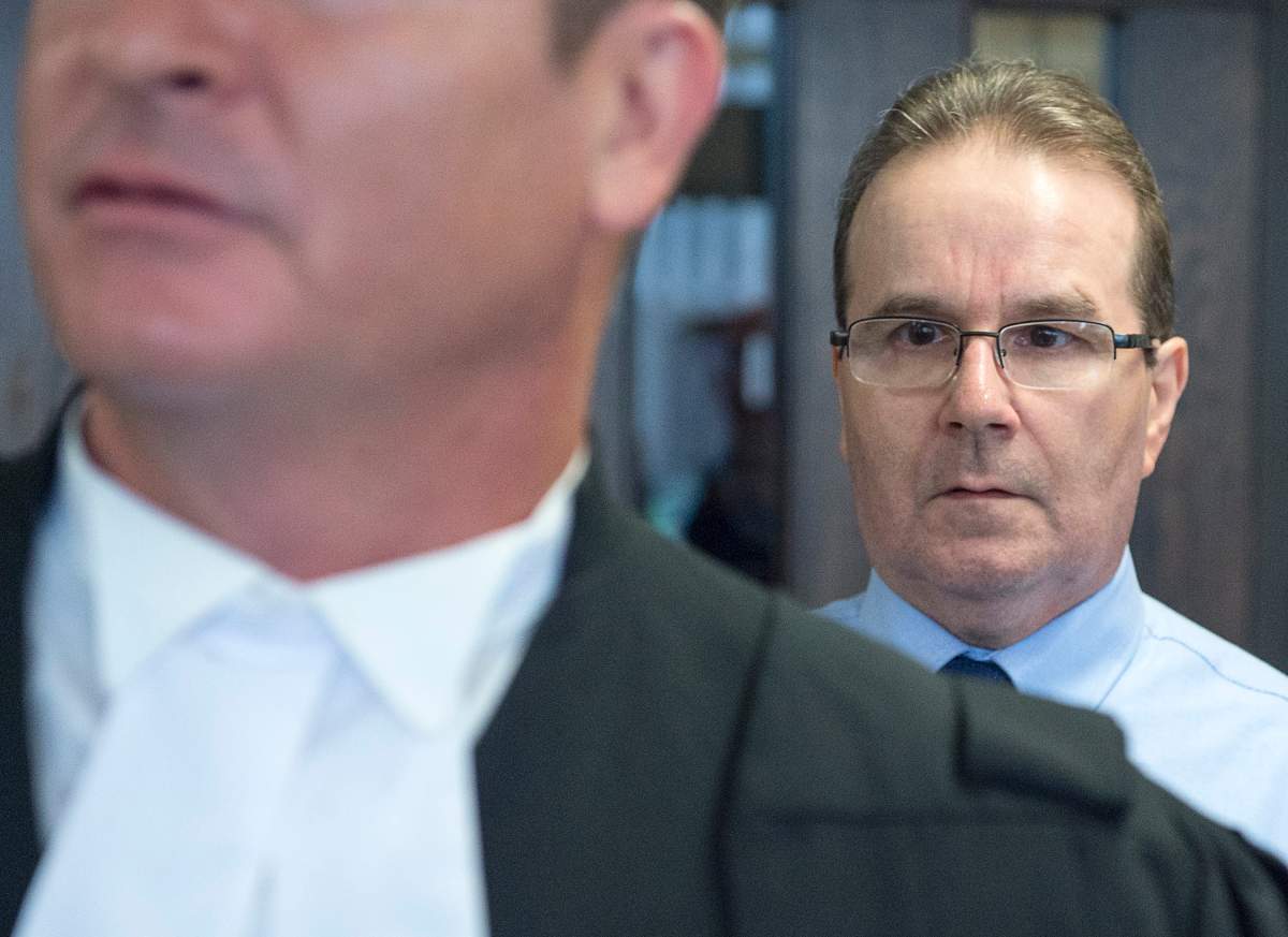 Glen Assoun, the Nova Scotia man who spent almost 17 years in prison for a crime he didn't commit, follows his lawyer Sean MacDonald from Supreme Court in Halifax on Friday, July 12, 2019. 
