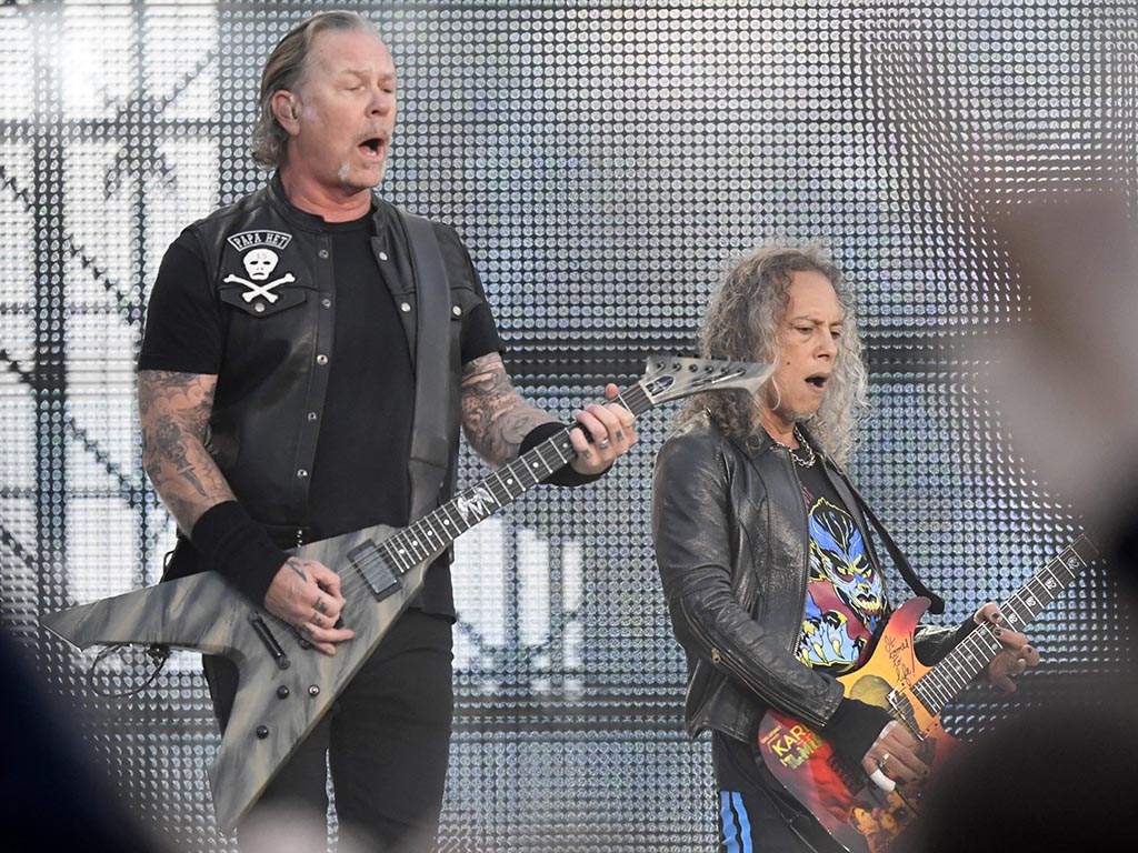 James Hetfield (L) and Kirk Hammett of Metallica perform o stage during the band’s ‘WorldWired’ tour concert in Hämeenlinna, Finland, on July 16, 2019.
